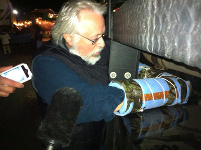 Leonard Higgins, a climate justice activist locks down to a megaload. Photo courtesy Portland Rising Tide.
