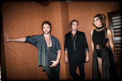 Aja Volkman (right) with Nico Vega guitarist Rich Koehler (left) and drummer Dan Epand