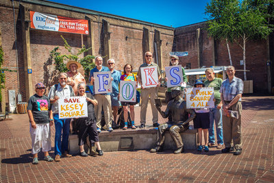 Founding members of Friends of Kesey Square gather in the downton plaza they hope to revitalize